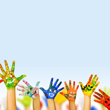Image,Of,Human,Hands,In,Colorful,Paint,With,Smiles